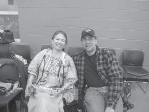 Vivian Carlson enjoyed visiting with her son, Eric Carlson. Since the PowWow was the day before Mother’s Day, all of the moms at the PowWow received corsages.