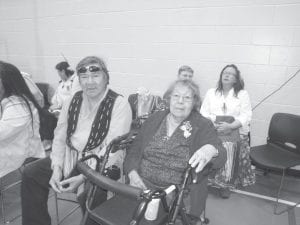 Ed Long and Doris Blank had front row seats to watch the drum and dancers.