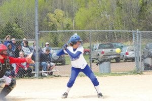 Theresa Morrin focuses on the ball just before she whacks it a mile. Okay, a half mile, but Morrin got a nice single on this trip to the plate.