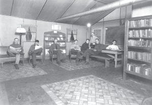 The Cook County Historical Society is nearing completion of its project documenting the days of the Civilian Conservation Corps. Of the 61 camps authorized for Minnesota, 16 were active in Cook County from 1933-1942. This photo is of the library at the Hovland Company 722. Joe Spitznagle, the camp’s educational advisor, is standing. Spitznagle’s degree was in industrial arts and it was his job to prepare CCC enrollees for jobs when they left the CCC camp. The camp newsletter reported on the library in its March 26, 1937 issue, noting “Since the arrival of a new traveling library last month, a great many more men have been reading books than ever before. Last month some 150 books were read by enrollees of this company.”