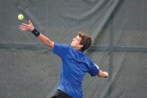 David Bergstrom serves up an ace in the Section 7A finals. Bergstrom has lost only one match this year.