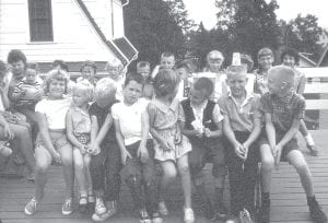 This delightful photo was taken on the deck above Mable Stoltz’s garage, about 40 years ago. Ralph Johnson, who shared the picture with the News- Herald, is the young man with the punch cup on his head. Next to him on the right is Buck Benson. Becky Johnson Kaiser is on the other end of the bench and Ralph said he believes that Mark Johnson, his sister Susan, and Ralph Larsen are also on the bench. Linda Hedstrom is in the back. Johnson said he can’t identify any other kids and he didn’t know if this was a birthday party, or, he said, “It might have just been Mable giving a party for the kids in the neighborhood.” Do you know who is in this photo?