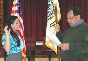 Grand Portage Tribal Chair Norman Deschampe administers the oath of office to new Grand Portage Tribal Chief Judge Christina “Tina” Deschampe.