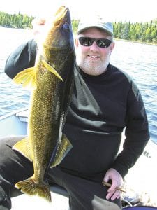 Brad Ludlow of Lutsen caught this 30.5-inch walleye in Lake Saganaga while fishing with Mike Berg of Seagull Creek Fishing Camp. Ludlow was using a big minnow in 13 feet of water. He also netted two 28-inch walleyes and one at 26.5 inches. All fish were released back into the water.