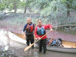 Natalie Warren, holding the paddle, and Ann Raiho have embarked on a 2,250-mile canoe trip that will take them from Minneapolis to Hudson Bay. If they accomplish this feat, they will become the first women to do so. Both graduated from St. Olaf College this spring and will spend at least 3 months on the rivers and trails as they paddle and portage their way to Hudson Bay.