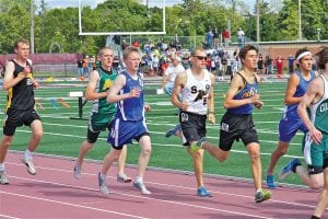 Three Cook County High School track athletes headed down to the Minnesota Class A track meet at Hamline University last weekend: Molly Zafft in her first-ever appearance and returning State competitors Kieran Scannell and Ailee Larson. Left: Senior Ailee Larson finished strong in the 800-meter finals at the Class A State Track Meet, June 11, capturing 4th place. Above: Sophomore Kieran Scannell stayed in the middle of the pack on the first lap of his 1600-meter run at the State finals, June 11th, at Hamline University. He went on to capture 7th place in this race and earn a medal.