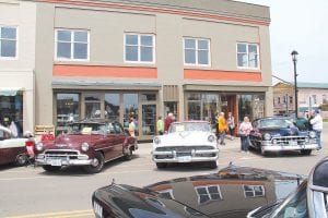 The Grand Marais Chamber of Commerce Classic Car Show on Saturday, June 11 filled Wisconsin Street with beautiful machines. These classic cars look like they belong in the same era as The Market building.