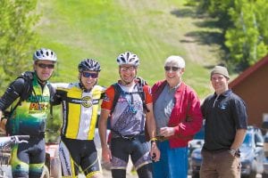 George Nelson, founder of Lutsen Mountains, was there at the start—and the finish of the first Lutsen 99er. Celebrating at the finish were (L-R) Dan Dittmer (2nd), Sam Beveridge (1st), Todd McFadden (3rd), Nelson and Race Director Adam Harju.