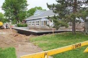 Construction on the addition to the Grand Marais Public Library is moving along quickly. The footings and foundation are finished and the interior has been gutted. Soon bathroom demolition and removal of the east and south walls will begin.