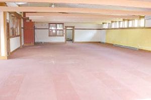 Left: The old library space has been emptied out and looks rather large now. The existing space will be renovated along with the construction of an addition to the building.