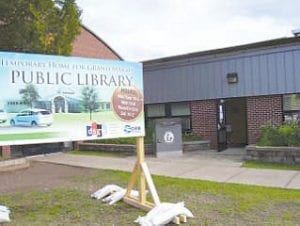 Right: Library services have been temporarily relocated to the former district office and Jane Mianowski Conference Center at Cook County High School.