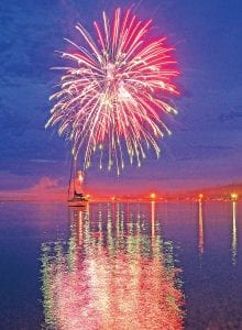 Right: The fireworks over Lake Superior—whether in Grand Portage, Tofte, or as seen here in the Grand Marais harbor— are always spectacular.