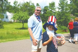 The Tofte parade along the scenic Tofte Park Road was a delight as always and included characters such as this small “Uncle Sam.”