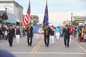 Above: American Legion Post 413 did double duty once again, leading the 4th of July parades in both Tofte and Grand Marais. Joining them in Grand Marais was the American Legion Ladies Auxiliary.