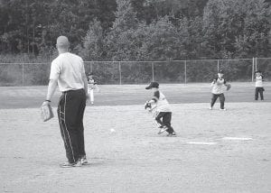 The Yankees played hard in the Parent Pitch game against the Lions on June 28. (L-R) Abbie Crawford, Jacob Dorr, Adam Dorr, Ella Sporn.