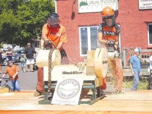 One of the featured events and a crowd favorite at the Fisherman’s Picnic Lumber Camp is the stock saw chainsaw contest that features two competitors going headto head to see who can saw through (up and down) a 20-inch lathe turned white pine. The contest tests both skill and strength of the competitors, not to mention their ability to stay focused and not panic under pressure.