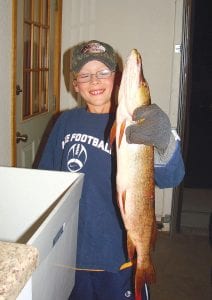 The Dorr family has had a fabulous fishing season so far in some “secret holes.” Above, Adam Dorr with a five-pound northern.