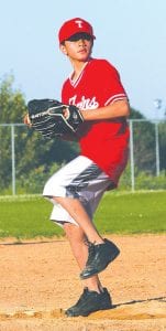 John Ray Mendivil gets ready to deliver some “heat” at a recent Little League game.