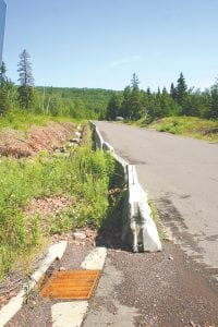 Fifth Avenue West north of the new Gunflint Trail in Grand Marais is moving up high on the list of Cook County Highway Department projects. On July 19 the county board gave County Engineer David Betts the go-ahead to seek an easement from the City of Grand Marais and to solicit bids for the project. The ditch will be re-established and undermined areas will be backfilled.