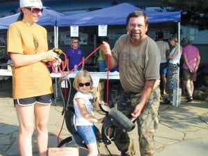 This tire swing—a Gunflint moose, of course—was donated by Martha James. It was a hot item on the live auction emceed by Michael Valentini, going to Margie and Jo Grinnell of Loon Lake.