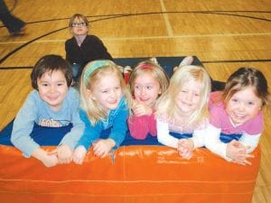 These cheerful kids are enjoying the climbing and bouncing toys at the Early Childhood Family Education program Open Gym. To fund Open Gym and other parenting and childhood education programs, E.C.F.E. parents will be hosting a pancake breakfast on Friday and Saturday, Aug. 5 – 6, during Fisherman’s Picnic.