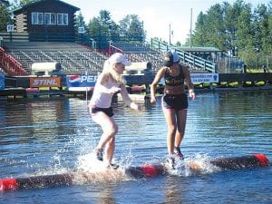 Jessica Berg-Collman had a fantastic tournament at the Namekagon River Roll- Offs held July 23 in Hayward, Wis. Jessica placed first in the U17 age group and later placed first in the semi-pro division. It was her first time competing in the semi-pro class. Only semi-pro and professional logrollers are allowed to wear spikes in competition, so it was her first time wearing spikes. Jessica will compete in the World Championships this week at the same venue in Hayward, Wis.