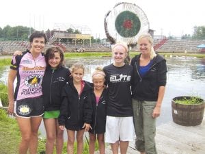 Above: Head coach Jenny Atkinson was proud of the way her young protégés rolled at the Namekagon River Roll-Offs. Standing with Jenny (L-R) Wellesley Howard-Larsen, Lucy Shaw, Paige Everson, Jessica Berg-Collman and Julie Collman.