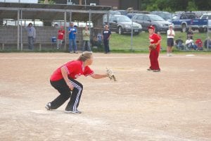 As Bradley Wilson looks on from the pitcher’s mound, Mariah Deshampe gets ready to catch the throw from the second baseman who fielded a slow grounder and made the play to cause an out. Baseball, T-ball, and Parent Pitch wrapped up their regular seasons last week. Little League will play its championship game on July 31 at 6 p.m. Parent Pitch will have its championship game just before the Little League match-up. Both games will be played at the Pappy Wright Little League field.