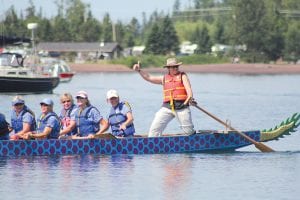 Steerswoman Tess Bailey of Hovland encourages her team as they head to the starting line.