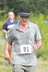 Race-walker Braidy Powers of Grand Marais power-walked the Pincushion Trails and finished in 0:54:47.4.