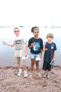 Taking first place in the Fisherman’s Picnic Rock Skipping Contest was Aaron Johnson (left) of Forest Lake with 17 hops, skips and pitty-pats. In second place was Nick Rowe (right) from White Bear Lake and in third, Kelcy Taylor of Minneapolis. Rock on, rock skippers!