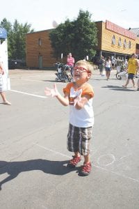 This little guy can barely contain his excitement as he prepares to try to catch an egg in the Blue Water Café Egg Toss Contest. This event is new this year and as you can see, it was greatly enjoyed by participants. The winners of the event were Brad Duncan and Don Robertson who tossed an egg an amazing 95 feet.