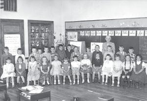 Steve Jacobsen of Upland, California and Hovland, shares another photo this week of his Class of 1967 classmates. In 1957, the graduating class of ’67 had enough students to fill two classrooms at Grand Marais Elementary School. They were (L-R, front) Joy Thompson, Sandy Leng, Susan Oullis, Lenore Peterson, Betty Nelson, Sandra Staples, Lavonna Saethre, Donna Healy, Linda Naddy, Peggy Smith, Bernadine Larsen, Carol Hough, and Mary Waha. (L-R, standing) Ron Wilson, Glenn Peterson, Charles Peck, Stephan Faulkner, Leonard Sylvester, Edward Olson, Billy Lee, Jim Ridgeway, Dale Speck, Dick Pederson, Steve Massie, John Quaife, Fritz Sobanja, Bruce Smith. Mrs. Eva Jacobsen was the teacher.