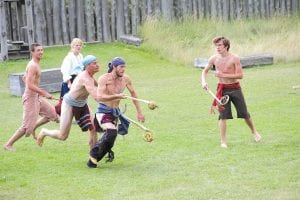 The competition was fierce in this lacrosse game on the lawn of the Grand Portage National Monument on Saturday, August 13.