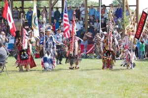 The pageantry of the Grand Portage Rendezvous Days PowWow is never more apparent than in the dignified Grand Entry. Tribal leaders with staffs and veterans with flags led the way on Saturday, August 13, 2011.