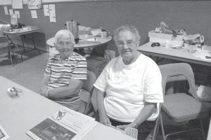 Vi Rindahl (left) and Eleanor Waha are two fixtures at the Cook County Fair who have put in countless hours over many decades and have been instrumental in keeping the annual tradition alive.