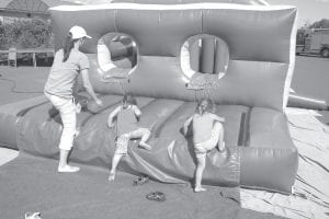 The inflatable obstacle course was a winner with the kids at the fair. During the last half hour, owner Bob Doucette let the kids run through as many times as they wanted for free—and did they ever go fast.