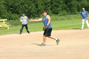 Above: Randy Spry pitching in the Pederson’s Disposal versus the Warriors game on Saturday, August 13. The Pederson’s Disposal team finished third in the Rendezvous Days Softball tournament. Left: Brittany Trovall on the Higher Mark Construction team made a nice hit low into the infield in the Saturday, August 13 game against Cheers, a team from Cloquet.