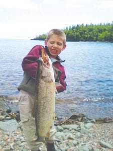 Little Braidy Smith has been at it again. He is pictured here with his biggest fish to date, a nice 6.5-pound lake trout caught in Horseshoe Bay in Hovland on July 30. Although it took Braidy awhile to land this lunker, he told his dad, Mike Smith of Grand Marais, that he is ready to catch something even bigger.