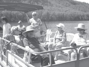 The Grand Portage Elders have been having a busy summer, enjoying some time on the water. Above: Elders enjoyed a barbecue, cards and pontoon ride on McFarland Lake during their annual outing to Gale and Carbine Carlson’s cabin. Left: They also enjoyed a cruise on Lake Superior on the Sea Hunter II on Saturday, August 27.