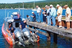 In addition to a dinner and pancake breakfast, the GLCC members conducted a beach cleanup and were given a tour of U.S. Coast Guard facilities—including this close-up look at the Coast Guard’s rescue boat.