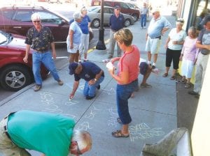 Members of the Great Lakes Cruising Club, in Grand Marais from August 19 -21, enjoyed a full weekend of activities, including a rally dinner at Sven & Ole’s on Broadway. Before the dinner, they got a kick out of drawing their boat names in chalk on the sidewalk in front of the restaurant.