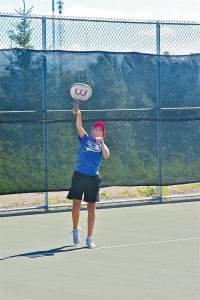 Cook County seventh-grader Marin Hay serves the ball during her No. 1 doubles match. The Vikings' tennis team had a tough outing against the more experienced Marshall and Aitkin girls’ tennis teams on Thursday, August 25.