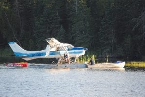 The recovery of this 1960 Cessna 182 took about six hours on Saturday, August 27. The plane flipped over during takeoff from the east end of Devil Track Lake, resulting in substantial damage to the plane, but no injuries to the pilot, Mike Raymond, or three passengers.