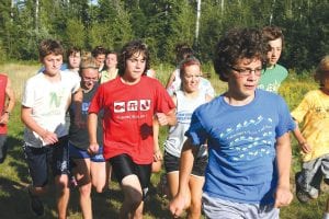 More than 30 cross-country Viking runners are being coached this fall by April Wahlstrom. Team members working out on Pincushion are (l-r) Roman Schnobrich, Emma Olfson, Joey Chmelik, Sarissa Falk, Will Seaton. In the back (l-r) Mara MacDonell, Kelly Summers, Adrianna Berglund.