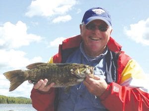 Above: Happy Evans of Shawnee, Kansas, caught this nice bass fishing with bobbers and a Beaver Flick with a leech in 4 feet of water. His fishing partner, Gayle Woods, also caught a nice bass while fishing with Joe Carlson of Joe’s Inland Fishing Guide Service.