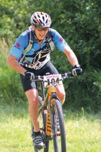 Doug Osborn of Decorah, Iowa was the first 15-mile male biker across the finish line in 1:41:15.5 with a steady pace of 5:48 mph.