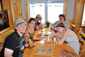 Grand Marais Playhouse Artistic Director Sue Hennessy and the dynamic Playhouse technical team celebrate the end of the season. (L-R, around table) Jack Nickolay, Yvonne Block, Will Brandenburg, Sue Hennessy, and Maria Nickolay. Part of the celebration was a round of mini-golf. Jack won the tournament!