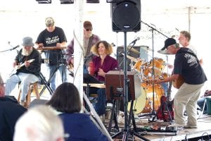 Radio Waves Music Festival features a fabulous lineup of local musicians, starting at 11:00 a.m. Saturday, Sept. 10 with the North Shore Community Swing Band and finishing on Sunday, Sept. 11 with Cook County’s Most Wanted. Left: Along with music, there is food, craft activities for kids, and dancing. Nancy Haarmeyer and Tom McCann took advantage of the big dance floor last year.