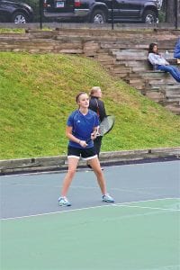 Above: CCHS freshman Libby Zafft concentrates on her serve during her #3 Singles match against Duluth Denfeld. Libby won the first match of the season for the Vikings, defeating Olivia Kinzinger (Duluth Denfeld), 6-3,6-1. Left: CCHS junior Cecilia Schnobrich waits to return a serve during her #1 Singles match against Duluth East on Aug. 31.